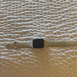 Silver Apple Smartwatch with cream Band